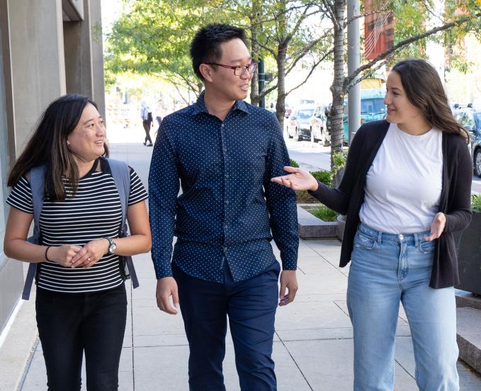 CU Denver doctoral students walking around the downtown campus