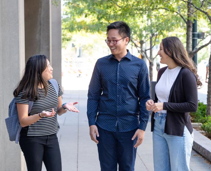 CU Denver students walking and talking on downtown campus