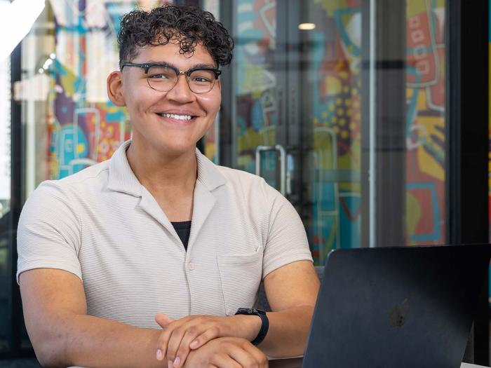 CU Denver student working on laptop