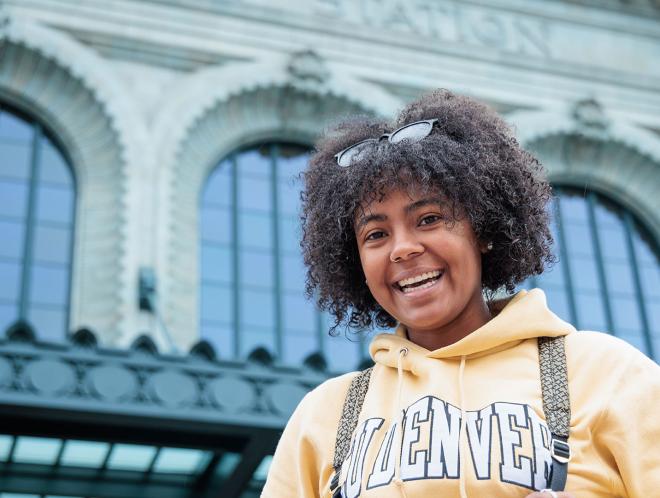 CU Denver student wearing branded hoodie on campus