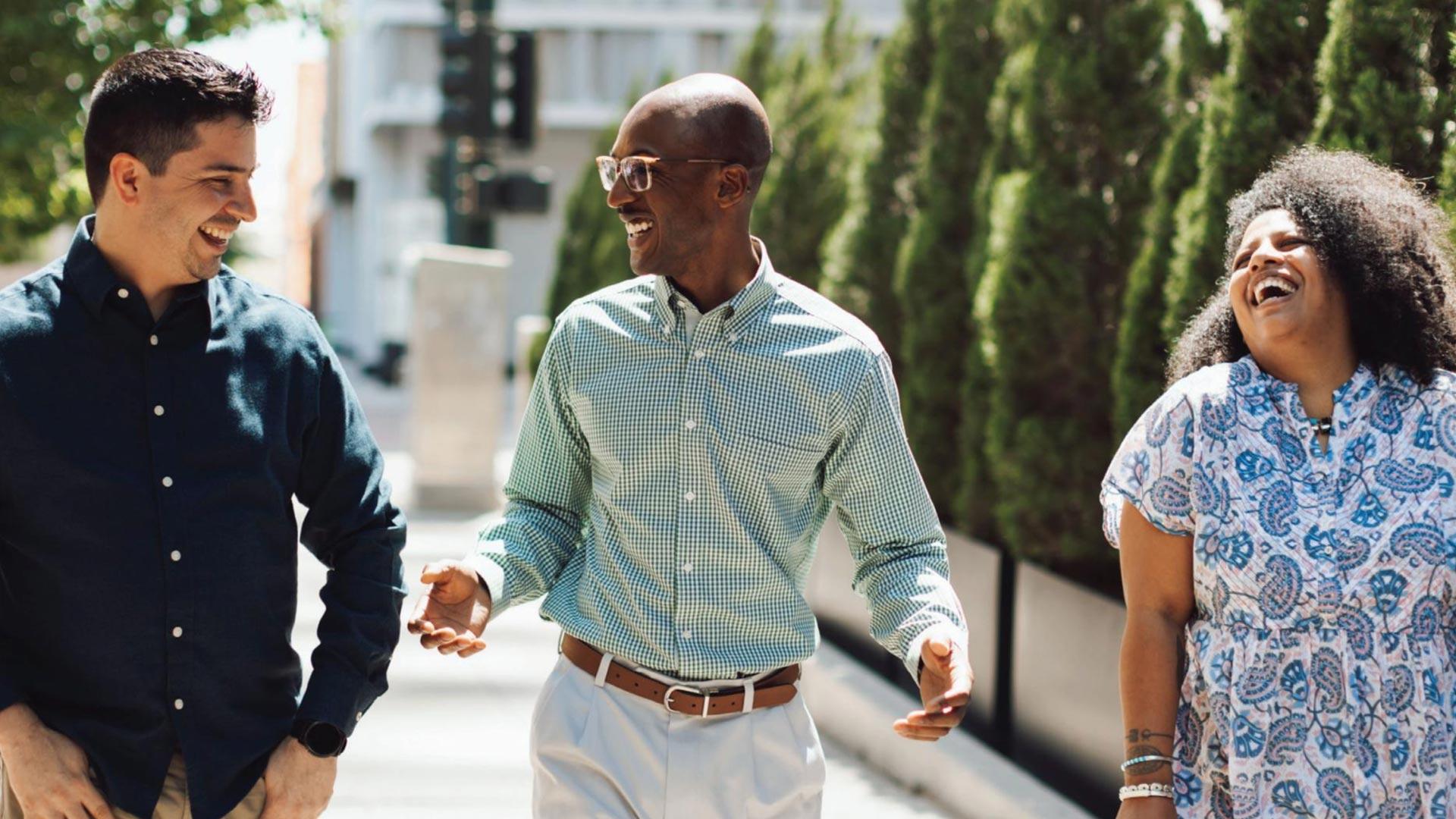 Doctoral students walking and talking
