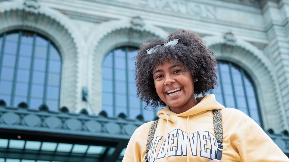 CU Denver student wearing branded hoodie on campus